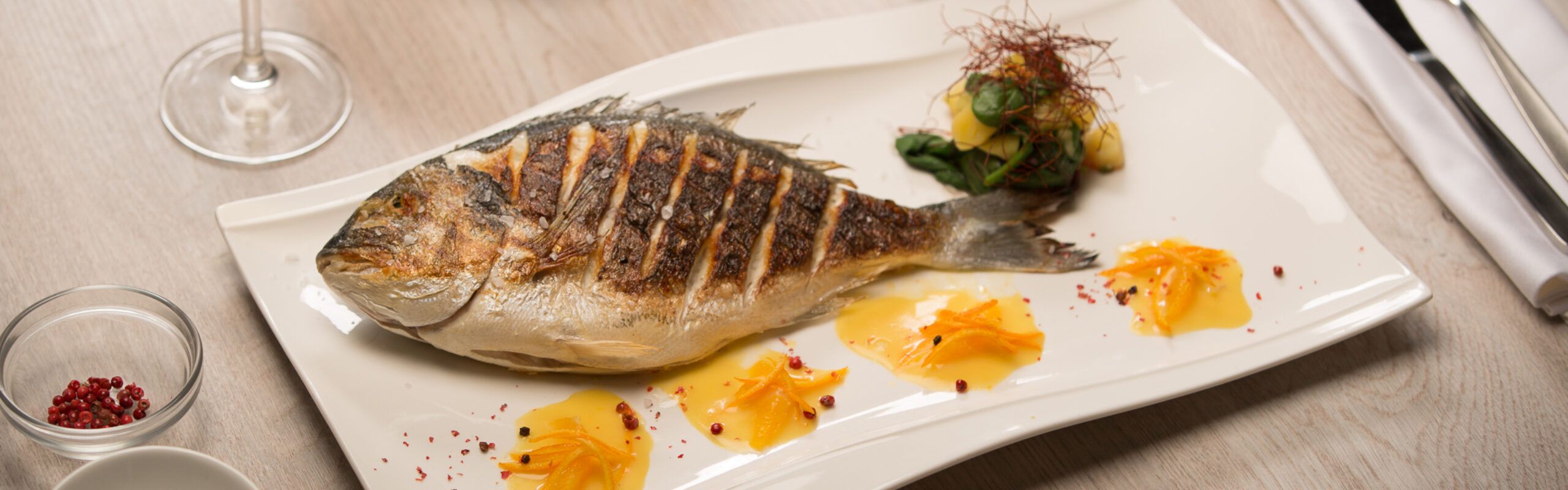Sea bream in orange sauce