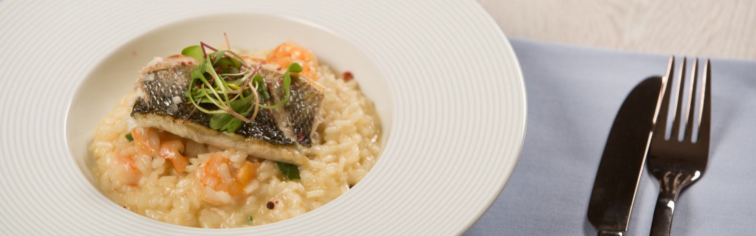 Filet brancina na rižotu od kozice i motara