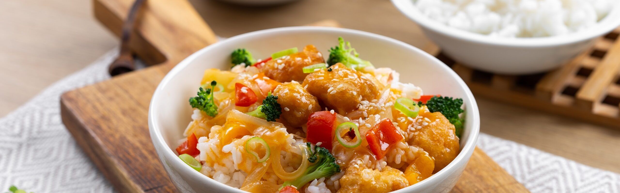 Sea bass in tempura with sweet and sour pineapple and vegetable sauce